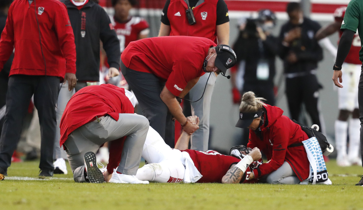 Devin Leary gets medical attention after his injury late in the third quarter